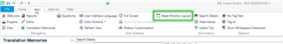 Trados Studio screenshot showing the 'Reset Window Layout' option highlighted in the 'View' tab.