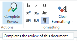 Screenshot of Trados Studio showing the 'Complete Review' button in the toolbar with a tooltip saying 'Completes the review of this document.'