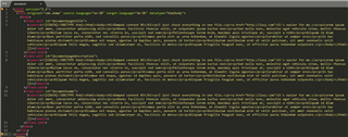 Screenshot of XML code in Trados Studio with CDATA sections highlighted in yellow.