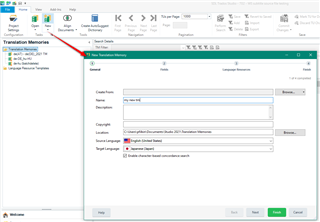 Trados Studio 2021 interface showing the Translation Memories view with a dialog box for creating a new translation memory, fields for Name, Description, and Language Pair are visible.