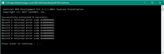 Command Prompt displaying multiple 'Successfully returned error code' messages from Sentinel RMS Development Kit license feature installation.