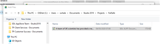 Trados Studio file explorer showing a folder named 'Projects' with a subfolder 'Test' containing a file named 'A team of UK scientists has produced a new estimate for the amount of...'.