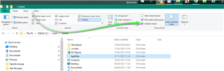 Screenshot showing Windows File Explorer with the VIEW tab selected and 'Hidden Items' checkbox highlighted and checked.