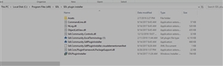 Screenshot of a file explorer window showing a list of downloaded files including TermExcelerator and SDL plugin installer.