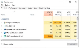 Task Manager window showing Trados Studio using 88.3% CPU under the Apps section.