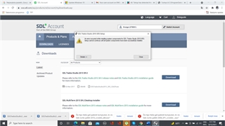 Trados Studio download page with a pop-up error message stating 'An error occurred while trying to download the file. Please contact SDL Support if the error persists.'