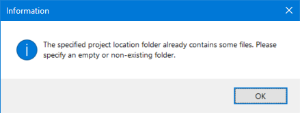Information dialog box in Trados Studio with an error message stating 'The specified project location folder already contains some files. Please specify an empty or non-existing folder.' with an OK button.