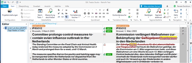 Screenshot of Trados Studio showing a warning message indicating that the term 'Brussels' was not updated to 'Amsterdam' after applying Retrofit.