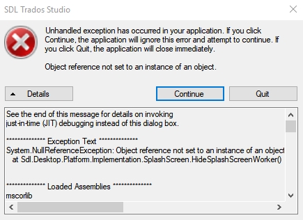 Error dialog box in SDL Trados Studio showing 'Unhandled exception has occurred' with details about a System.NullReferenceException error and a list of loaded assemblies.