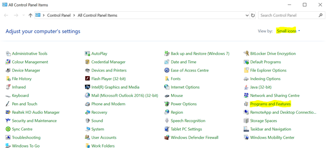Control Panel window with 'View by: Small icons' selected, showing various system settings including 'Programs and Features'.