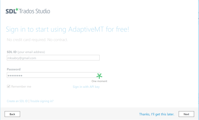 SDL Trados Studio sign-in screen for AdaptiveMT with email field filled in and a green checkmark indicating successful login.
