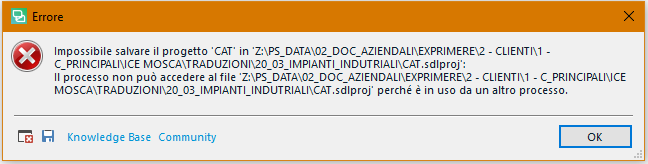 Error message in Trados Studio stating 'Impossible to save the project 'CAT' in the specified file path because it is in use by another process.' with an OK button.