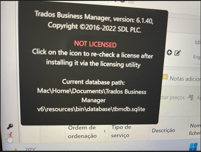 Error message on Trados Business Manager stating 'NOT LICENSED' and instructing to click the icon to re-check license after installing it via the licensing utility.