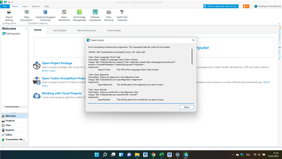 Trados Studio error message window overlaying the main interface, displaying 'Error processing command line arguments: The requested data file could not be located.' followed by usage instructions for command line arguments.