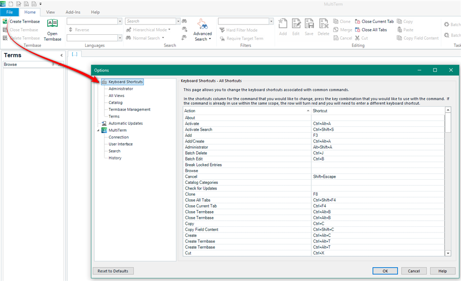 Trados Studio screenshot showing the Keyboard Shortcuts menu under File -> Options. A list of actions with corresponding shortcut keys is visible.