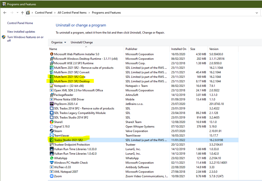 Control Panel window showing Programs and Features list with Trados Studio 2021 SR2 and MultiTerm 2021 SR2 Desktop highlighted for repair.