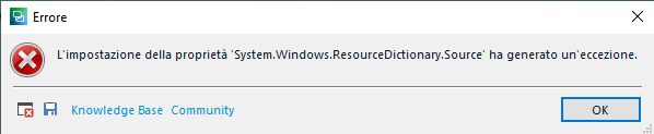 Error message in Trados Studio in Italian, stating 'The setting of the property 'System.Windows.ResourceDictionary.Source' has generated an exception.' with an OK button and links to Knowledge Base and Community.