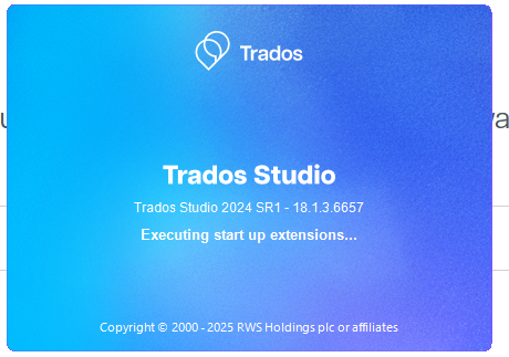Splash screen of Trados Studio 2024 SR1 showing version 18.1.3.6657 with the message 'Executing start up extensions...'.