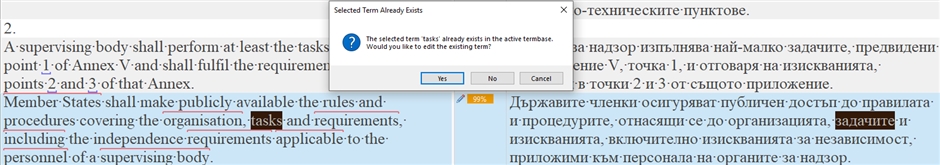 Screenshot of Trados Studio showing a dialog box with a warning that the selected term 'tasks' already exists in the active termbase, asking if the user wants to edit the existing term.