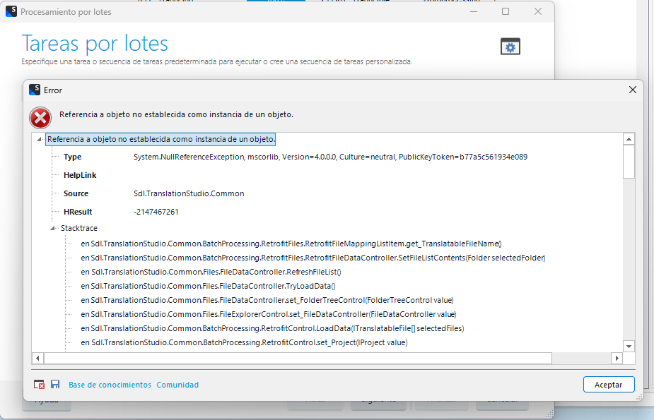 Screenshot of Trados Studio error dialog with the title 'Procesamiento por lotes' indicating a 'Referencia a objeto no establecida como instancia de un objeto' error. The error details include a System.NullReferenceException and a stack trace with multiple references to 'Sdl.TranslationStudio.Common'.